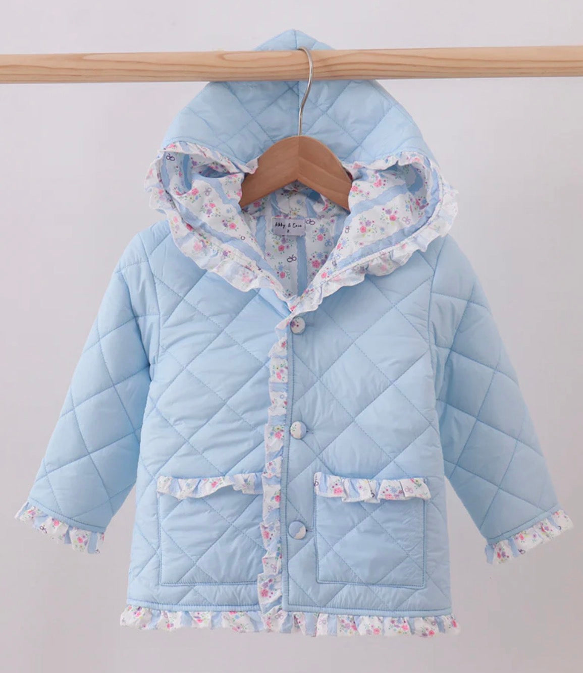 Girls blue ruffle quilted jacket