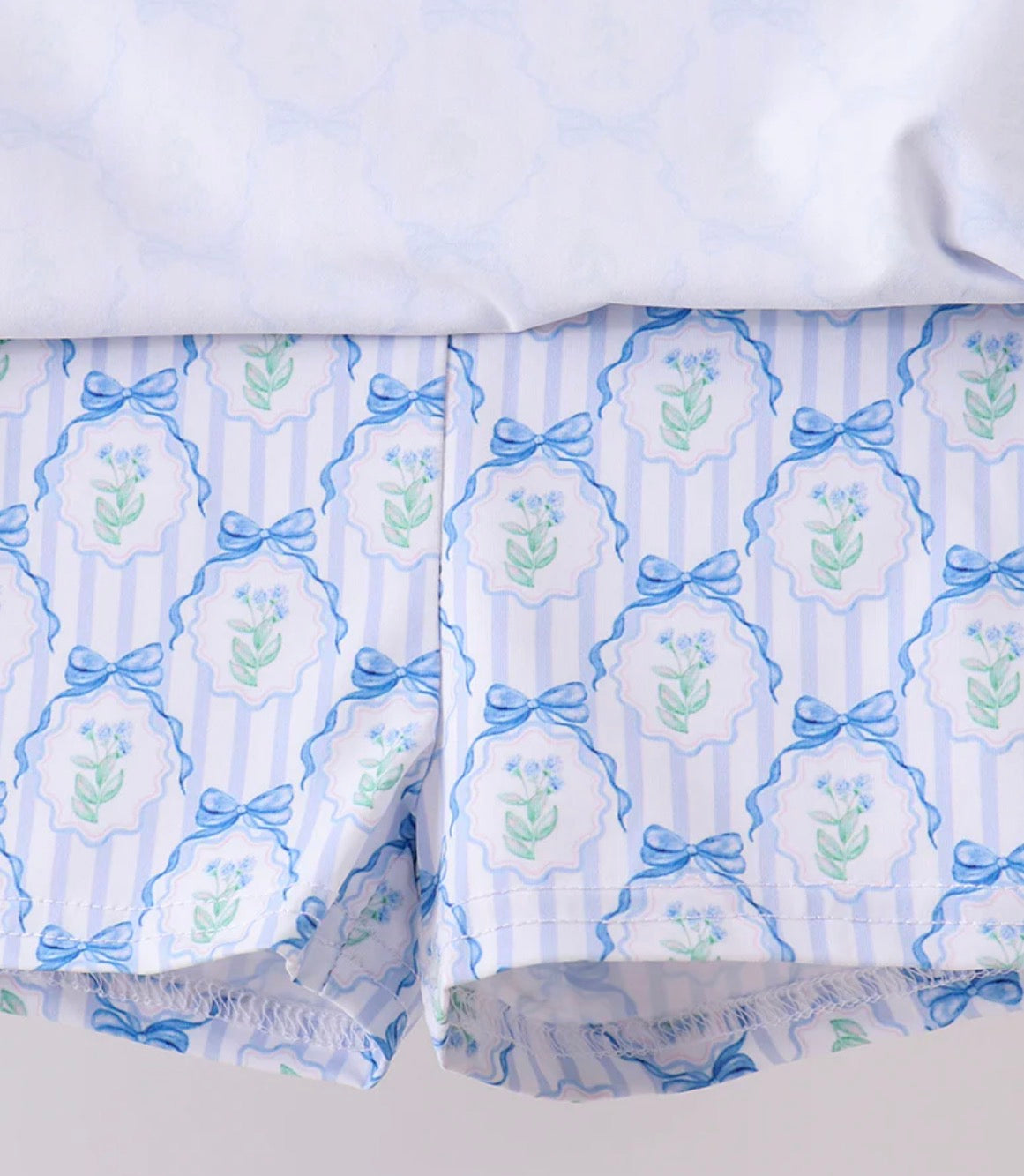 HD26 •Girls blue floral bow athletic skort set