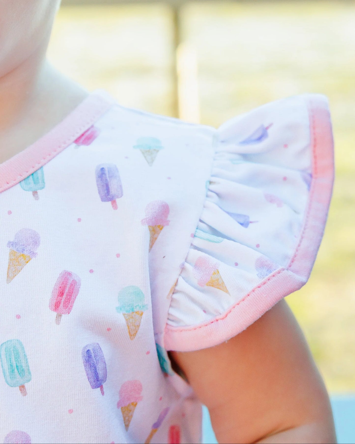 Jellybean • Girls summertime sweets flutter sleeve bubble.